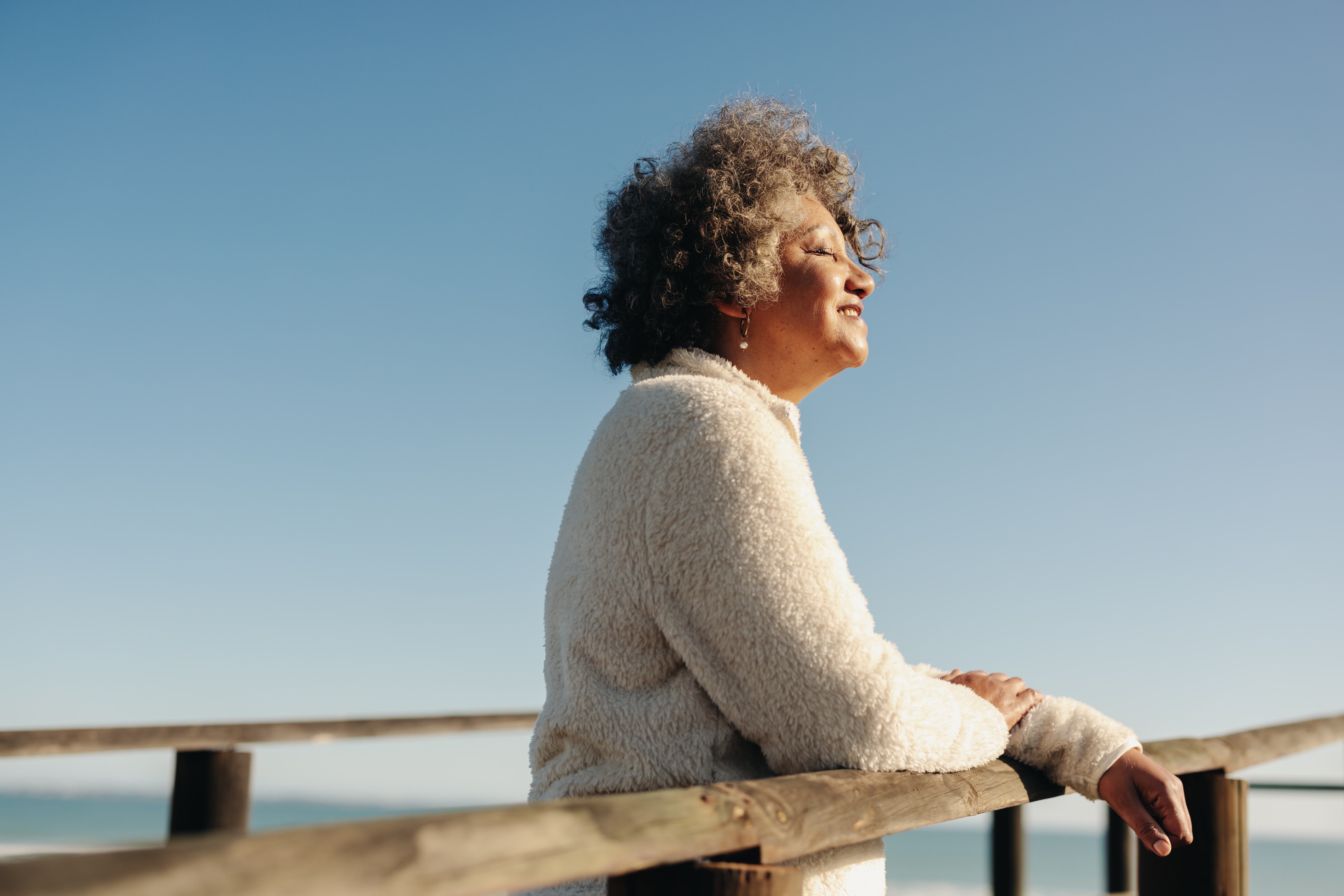 Enjoying,The,Sun,At,The,Beach.,Happy,Senior,Woman,Getting